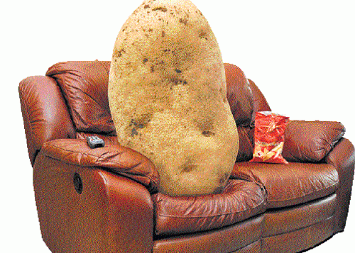 A potatoe sitting on a couch