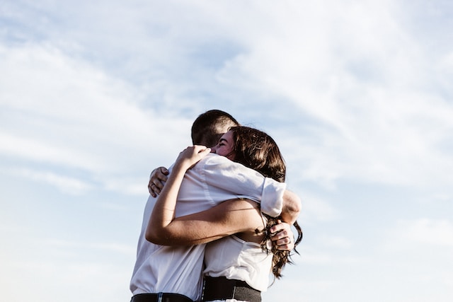 Two people hugging